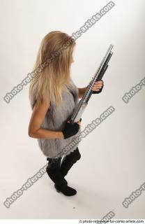 14 2018 01 NIKOL STANDING POSE WITH SHOTGUN